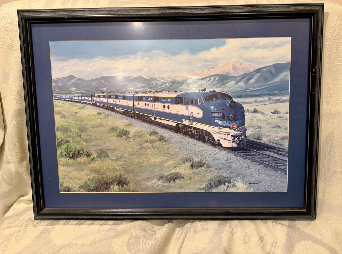 Framed Railroad Art – Missouri Pacific EMD in the Rockies Vast Western Landscape with Classic MoPac Streamliner